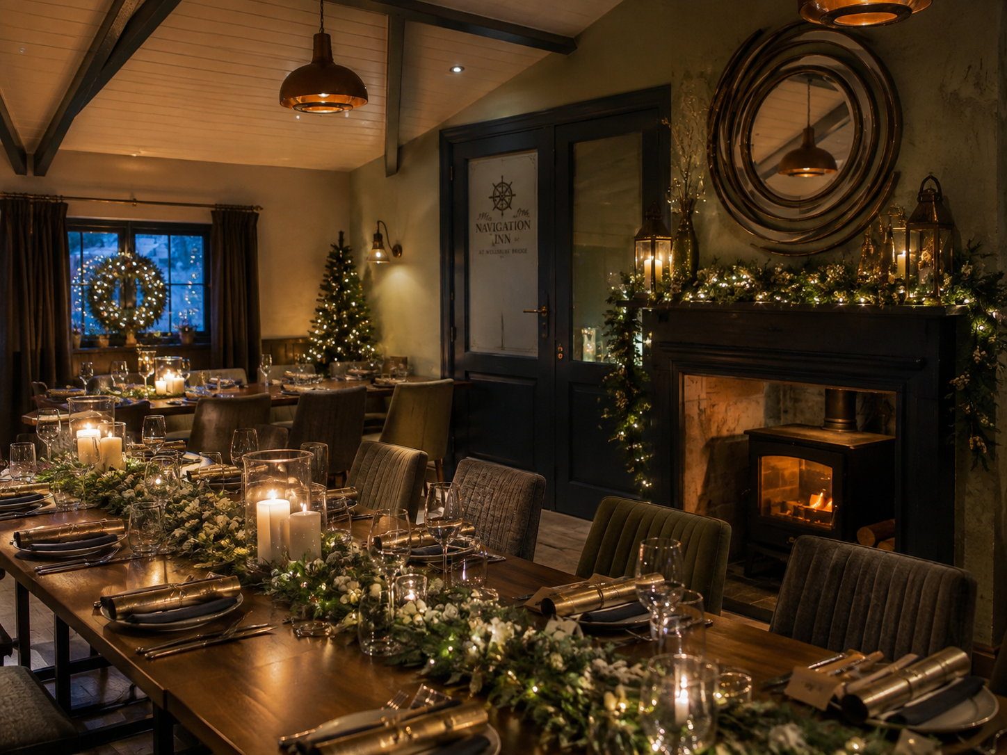 Candlelit table set for Christmas